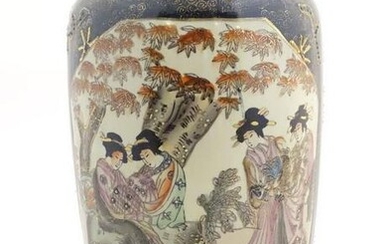 A Japanese vase with panelled decoration depicting