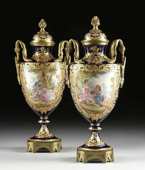 A PAIR OF ORMOLU MOUNTED SEVRES VASES