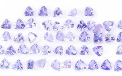 A PARCEL OF UNSET TANZANITES; 46 trilliant cut gemstones total 10.74ct.