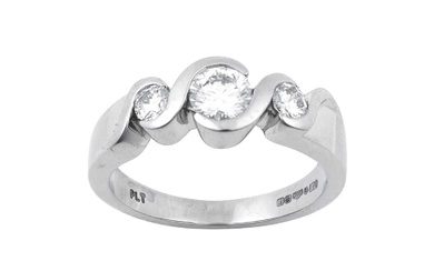 A Platinum Diamond Three Stone Ring the graduated round brilliant...