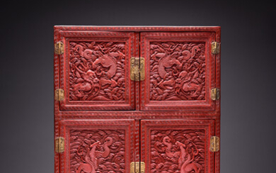 A RARE CHINESE IMPERIAL CINNABAR LACQUER 'DRAGON' CABINET