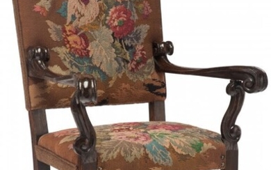 A Renaissance Revival Wood Armchair with Needlep