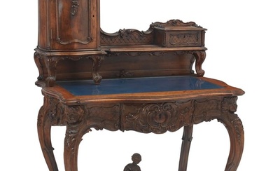 A Rococo-style carved walnut desk