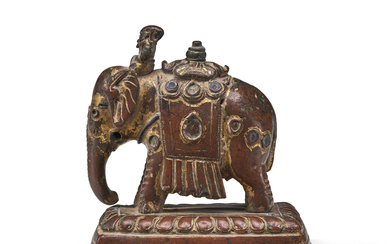 A SILVER-INLAID GILT-BRONZE FIGURE OF AN ELEPHANT TIBET, 17TH-18TH CENTURY