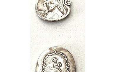 A SMALL CARD OF STERLING SILVER PICTORIAL BUTTONS