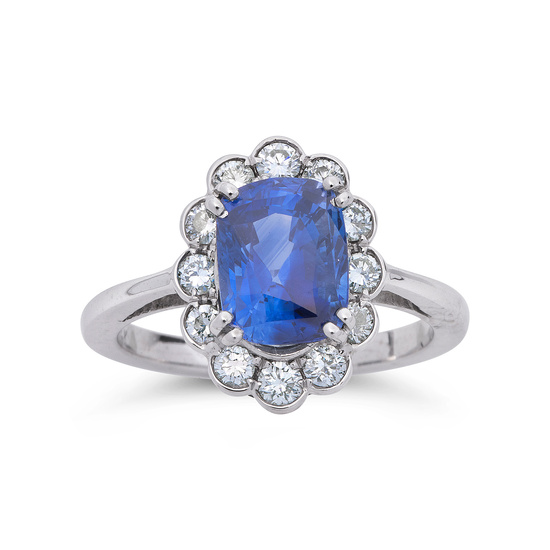A Sapphire, Diamond and White Gold Ring