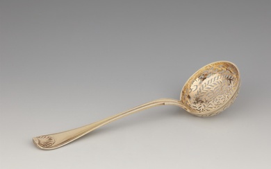 A Strasbourg silver gilt sugar casting spoon