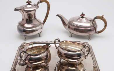 A THREE PIECE SILVER PLATED TEA SET AND A MATCHING HOT WATER JUG ON TRAY.