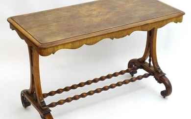 A Victorian burr walnut end table with a rectangular