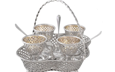 A Victorian silver quatrefoil four cup egg stand by Henry Wilkinson & Co.