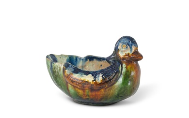 A blue and sancai-glazed 'mandarin duck' wine vessel, Tang dynasty 唐 三彩加藍鸂鶒酒卮