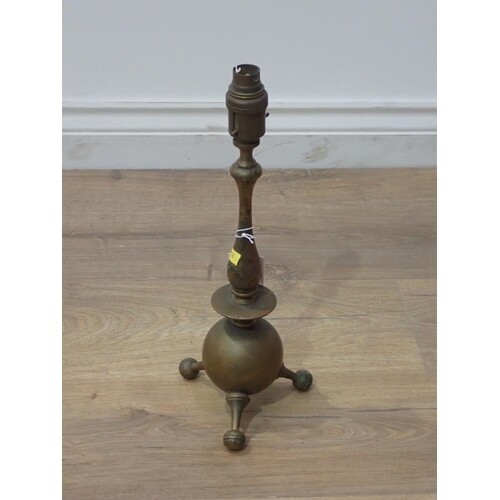 A brass Table Lamp in the manner of Christopher Dresser with...