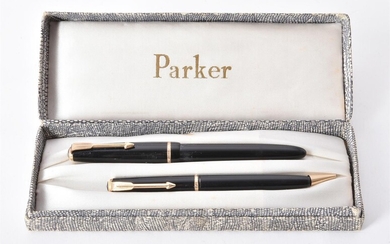 A collection of black Parker pens