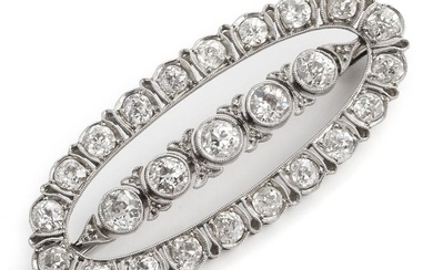 A diamond brooch set with numerous old-cut diamonds weighing a...