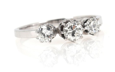 A diamond ring set with three brilliant-cut diamonds, mounted in 14k white...