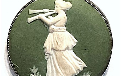 A division one figural women with an instrument button