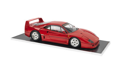 A factory-built 1:8 scale model of a Ferrari F40 by...