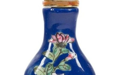 A famille-rose and blue enamel on glass 'flowering