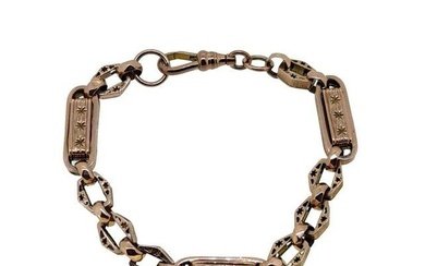 A fancy link bracelet, probably converted from a watch chain, three rectangular links, separated by