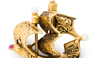 A gemstone and enameled fourteen karat gold brooch