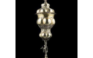 A gilded silver chalice with cover. Germany, 1745 - 1748. Undeciphered silversmith marks (h. cm 34) (g 400 ca.) (defects)