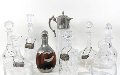 A glass claret jug, with silver plated mounts, 36cm high,...