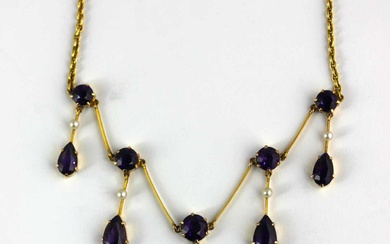 A gold, amethyst and seed pearl necklace, the front mounted...