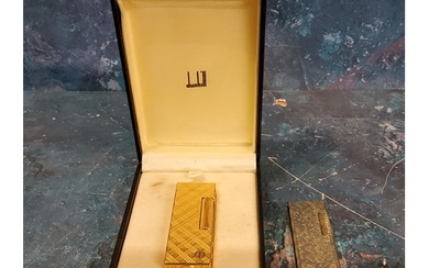 A gold plated Dunhill lighter, engraved with hatches, 6.5cm ...