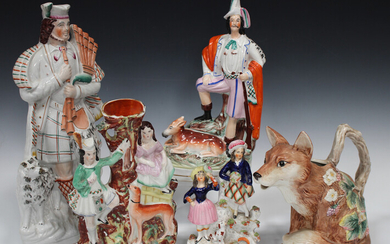 A group of decorative ceramics, late 19th and 20th century, including a large Staffordshire figure o