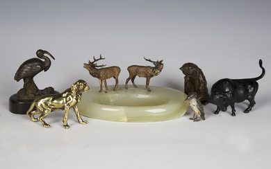 A group of mainly early 20th century cast metal model animals, including a cast bronze model of a st