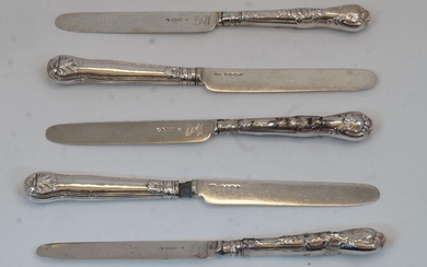 A group of silver knives with filled silver handles, comprising: five William IV knives, Sheffield, 1835, TS, Queens Pattern, with engraved crest to blades, two having blades detached; three Victorian knives, London, 1846, Elizabeth Eaton, one...