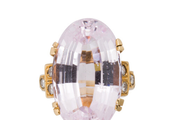 A kunzite, diamond and fourteen karat gold ring