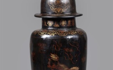A large Chinese lacquered papier-mâché vase and cover