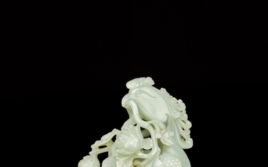 A large celadon jade 'phoenix and peony' group, Qing dynasty, 18th century | 清十八世紀 青白玉雕鳳凰牡丹紋擺件