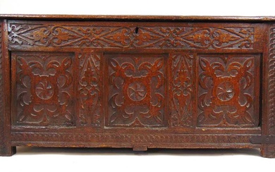 A late 17th/early 18th century walnut and oak coffer, the...