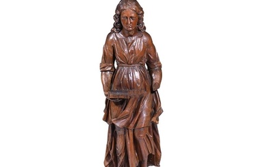 A late 18th/early 19th century North European carved walnut ...