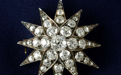 A late Victorian silver and gold, old-cut diamond star brooch.