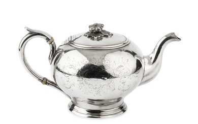 A mid 19th century American coin silver teapot, of globular...