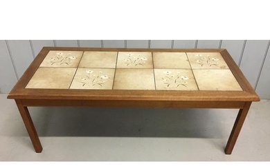 A mid-century tiled coffee table, by Mobelfabrik. Slight chi...