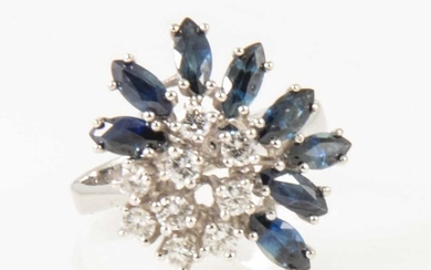 A modern sapphire and diamond cluster ring.