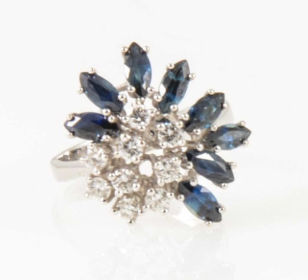 A modern sapphire and diamond cluster ring.