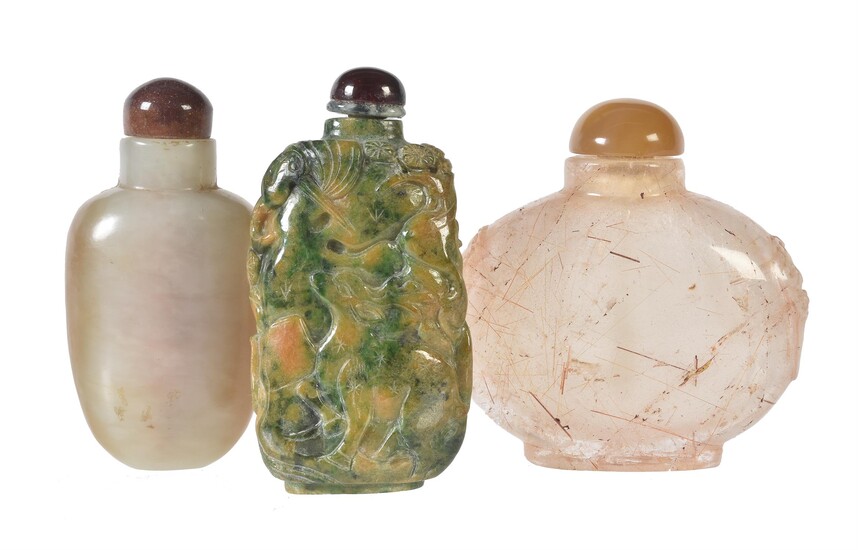 A mottled jade snuff bottle and stopper