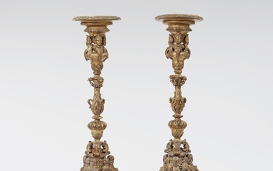 A museum quality pair of giltwood candelabra stands