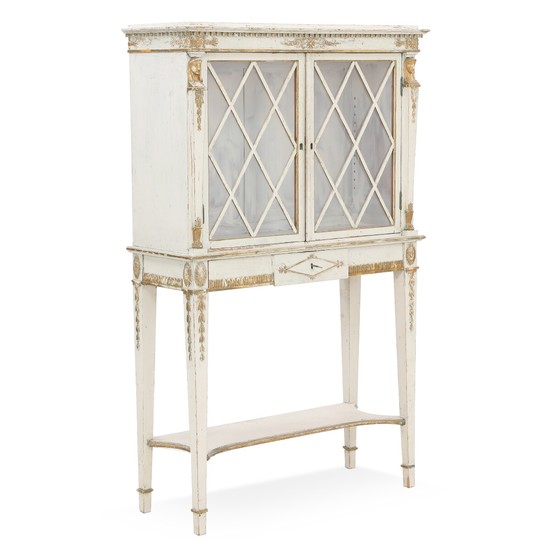 A painted and partially gilt Empire style display cabinet. 20th century. H. 138. W. 85 cm. D. 32 cm.