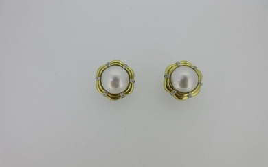 A pair of 18ct gold mabÃ© pearl and diamond earclips