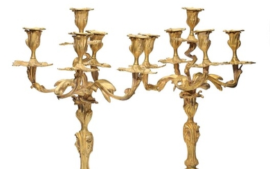 A pair of 19th century Rococo style gilt bronze five-armed candelabras. H....