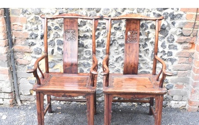A pair of 20th century Chinese Ming style yoke back hardwood...