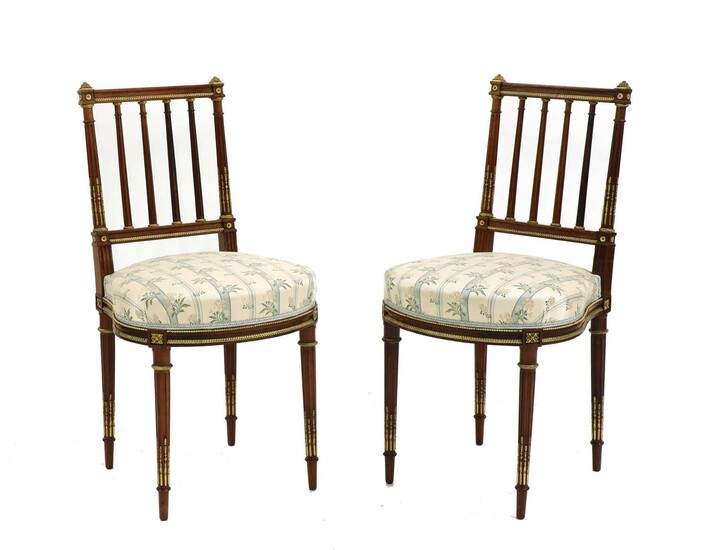 A pair of French Empire style rosewood side chairs
