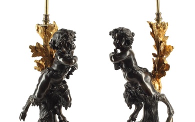 A pair of French gilt and patinated bronze and marble figures of satyrs now as table lamps, late 19th century