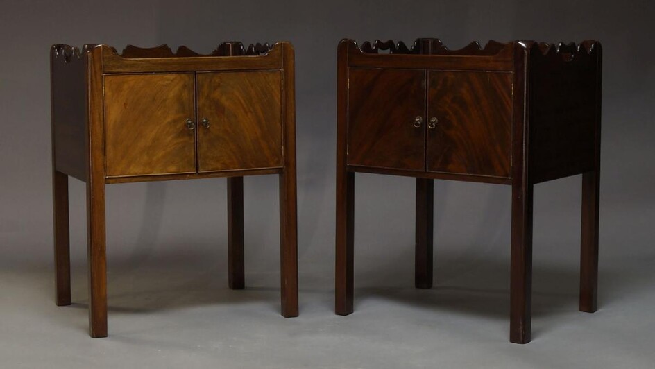 A pair of George III style mahogany bedside cabinets, late...